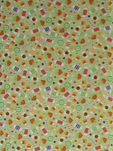 #353 - Riley Blake - Trick Or Treat - Colorful Candy On Lime Green