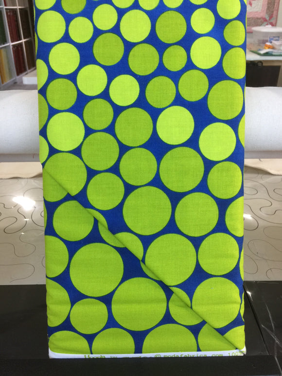 #113 - Hoopla - Moda - Lime green dots on a blue background